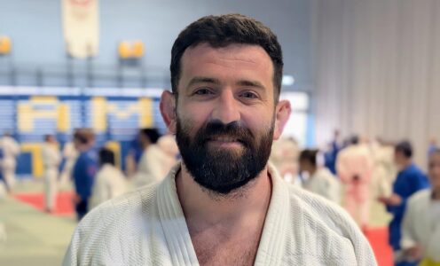 A headshot of Team Bath Judo coach Adam Hall.