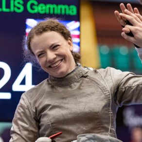 Para fencer Gemma Collis smiling as she is high-fived