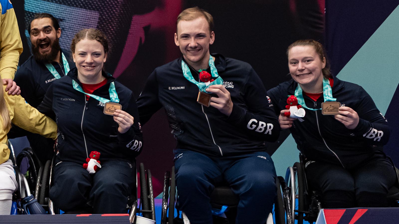 Four British para fencers with bronze medals