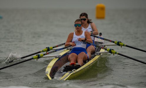 Two British rowers on the sea in a coastal double scull rowing boat